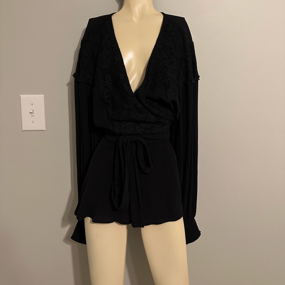 Black long sleeve tie top with lace accents